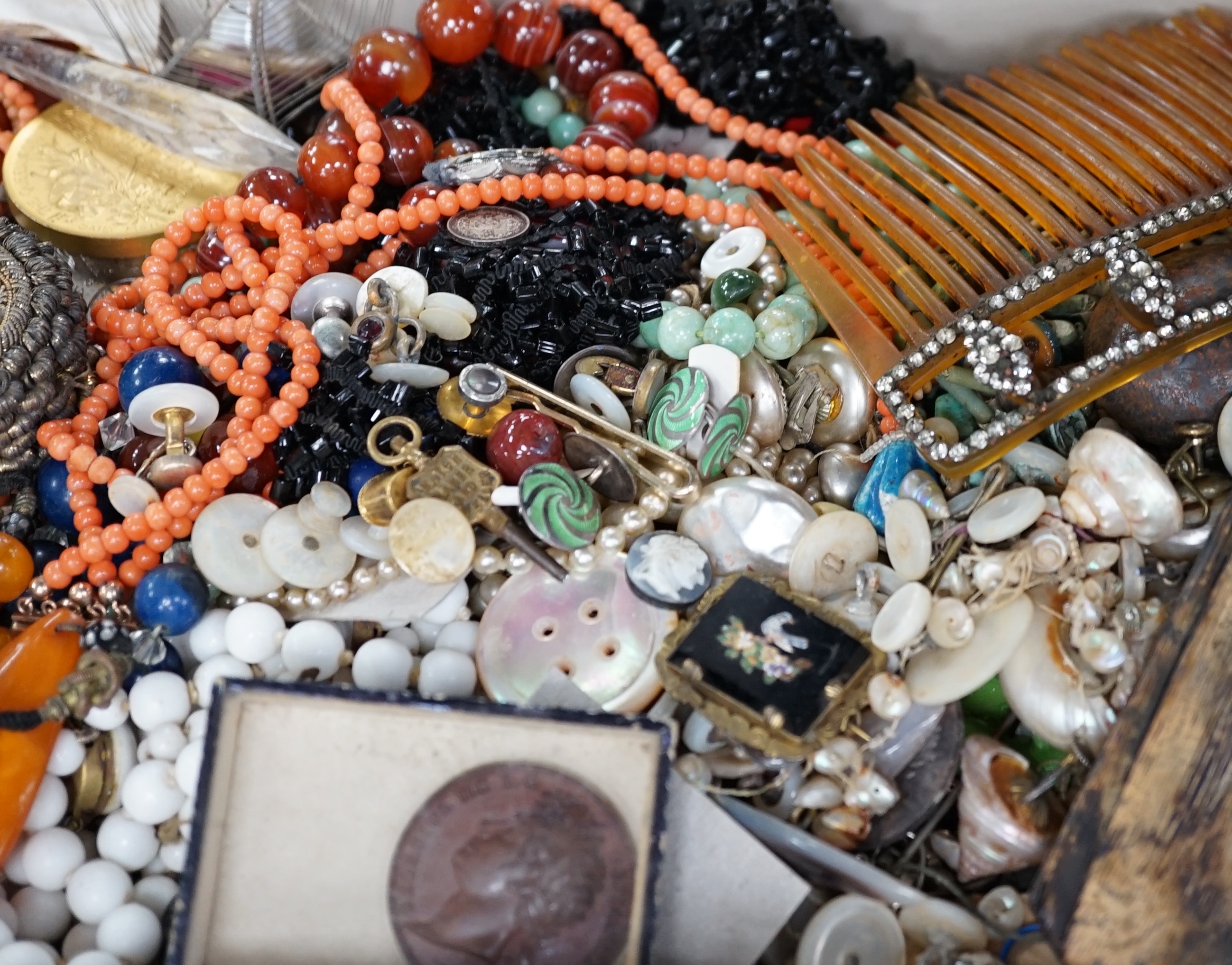 A mixed quantity of assorted jewellery and other items including carnelian agate, coral and amber necklaces, hair ornament, shells, spectacles, etc. Condition - poor to fair